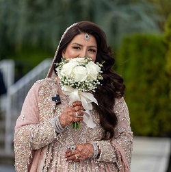 Bride Portrait with Bouquet | The Glorious Memories Bride in an embellished traditional outfit holding a white bouquet, photographed outdoors for The Glorious Memories bride photography in New Hyde Park, NY.